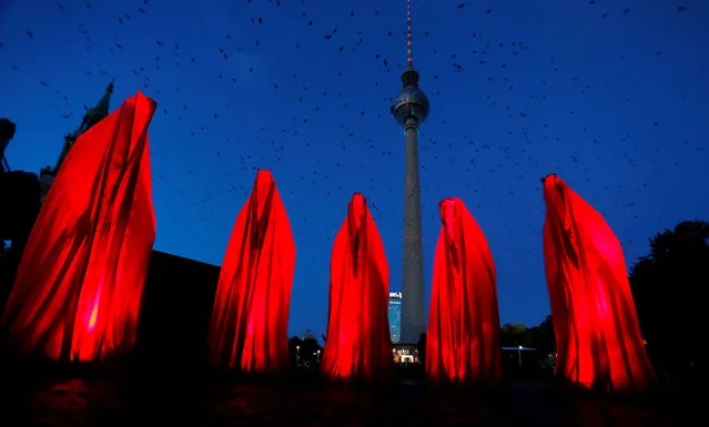 The TV tower is illuminated during the Festival of Lights show in Berlin, Germany, October 6, 2017. (Photo by Hannibal Hanschke/Reuters)