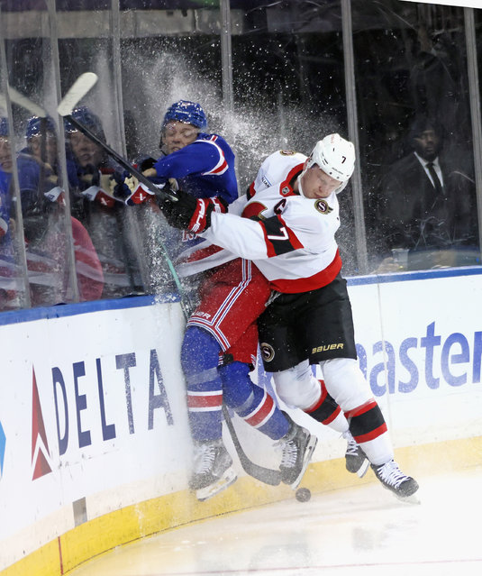 Brady Tkachuk #7 of the Ottawa Senators hits Will Borgen #17 of the New York Rangers into the boards during the first period at Madison Square Garden on January 21, 2025 in New York City. (Photo by Bruce Bennett/Getty Images)