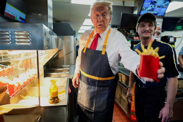 Donald Trump in McDonald’s – somewhere he claims to have a better knowledge of than Kamala Harris in Feasterville-Trevose, Pennsylvania, U.S. October 20, 2024. (Photo by Brian Snyder/Reuters)