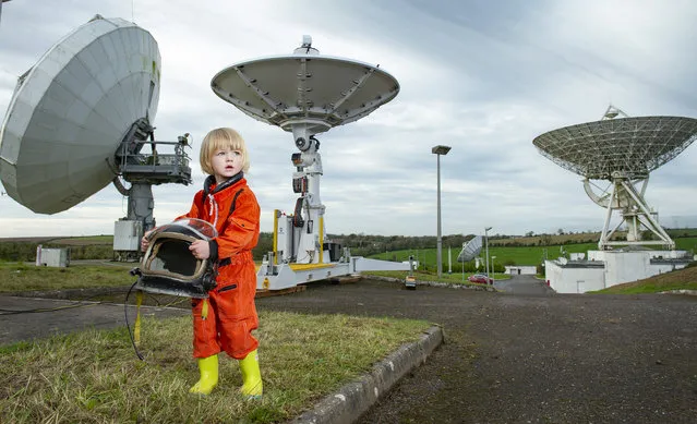Luke McCarthy  holds a space helmet on the new LeafSpace tracking antenna centre at the National Space Centre in Cork, Ireland on November 4, 2022 where it will track the progress of Virgin Orbit's Cosmic Girl and LauncherOne mission in December. (Photo by Gerard McCarthy/The Irish Times)