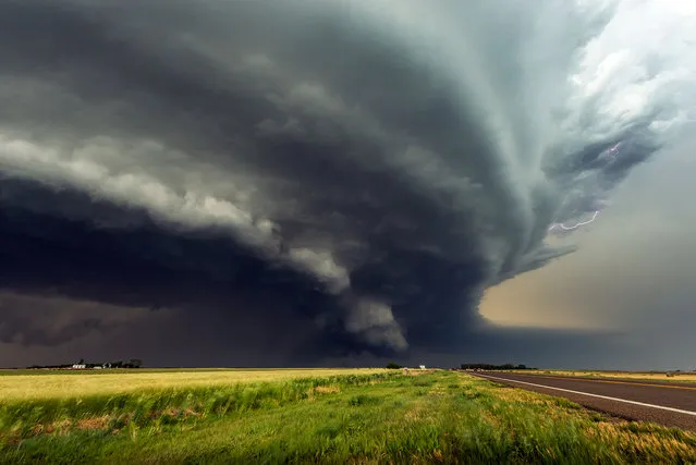 Tornadic supercell crossing Hwy 281 near Seward, Kansas. (Photo by Dennis Oswald/Caters News)
