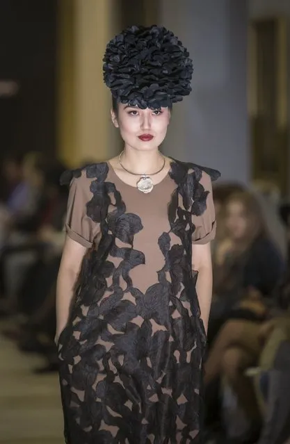 A model presents a creation by Kazakhstan's designer Zharkyn Baymakhanov during Kazakhstan Fashion Week in Almaty, Kazakhstan, October 14, 2015. (Photo by Shamil Zhumatov/Reuters)