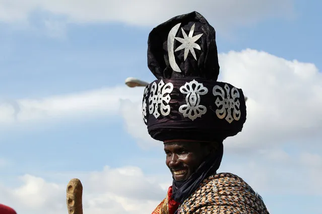 A tribal leader smiles as he waits for the start of the Durbar festival parade in Zaria, Nigeria September 14, 2016. (Photo by Afolabi Sotunde/Reuters)