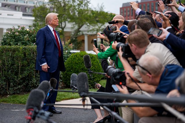 US President Donald Trump speaks to members of the media on the South Lawn of the White House before boarding Marine One in Washington, DC, US, on Friday, August 1, 2025. Trump told officials to fire Erika McEntarfer, the commissioner of the Bureau of Labor Statistics, hours after a report showed US job growth cooled sharply over the last three months. (Photo by Aaron Schwartz/CNP via Bloomberg)