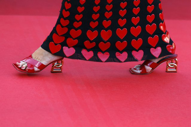 A guest poses on the red carpet during arrivals for the screening of the film “Megalopolis” in competition at the 77th Cannes Film Festival in Cannes, France, on May 16, 2024. (Photo by Clodagh Kilcoyne/Reuters)