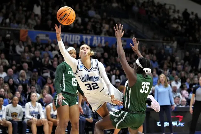 Villanova's Bella Runyan tries to shoot past Cleveland State's Amele Ngwafang during the second half of a first-round college basketball game in the NCAA Tournament, Saturday, March 18, 2023, in Villanova, Pa. (Photo by Matt Rourke/AP Photo)