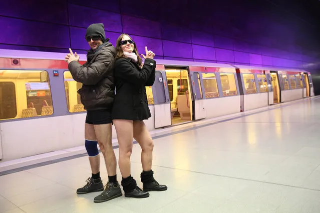 Karina (R) and Nicola, participants of the “No Pants Subway Ride Hamburg 2015”, pose in a subway station in Hamburg, Germany, 11 January 2015. The No Pants Subway Ride is an annual event, which started 2002 in New York/USA, finds participants all over the World. (Photo by Christian Charisius/DPA)