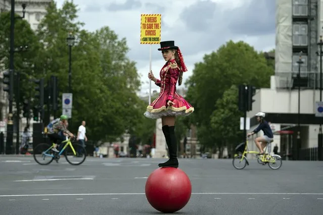 Circus performer from the Association of Circus Proprietors on Whitehall, London, Britain, 07 July 2020. The association handed a petition to Downing Street to ask British Prime Minister Boris Johnson to allow circuses to reopen. (Photo by Will Oliver/EPA/EFE)