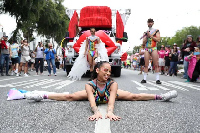 A parade participant dances during the 2023 WeHo Pride Parade in West Hollywood, California, USA on June 4, 2023. (Photo by Caroline Brehman/EPA)