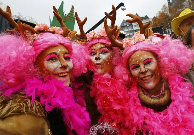 Revellers celebrate the start of the carnival season, a season of controlled raucous fun that reaches a climax during the days before Ash Wednesday and the start of Lent, at 11.11 am in Cologne, Germany, November 11, 2016. (Photo by Wolfgang Rattay/Reuters)