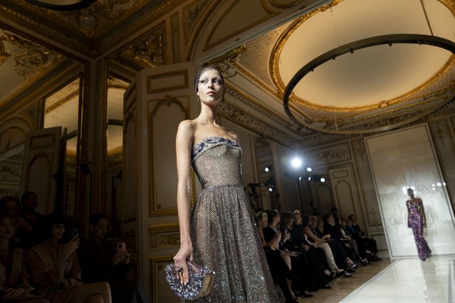A model wears a creation as part of the Giorgio Armani Prive Haute Couture Spring Summer 2025 collection, that was presented in Paris, Tuesday, January 28, 2025. (Photo by Lewis Joly/AP.Photo)