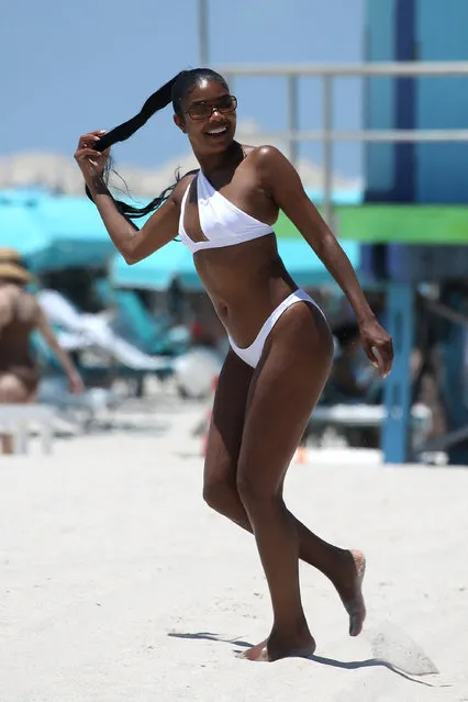 American actress Gabrielle Union looks amazing in a white bikini as she hits the beach in Miami on June 15, 2023. (Photo by The Mega Agency)