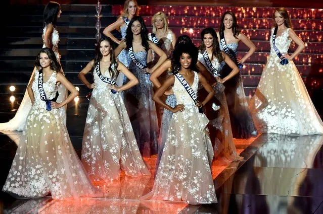 Miss France contestants stand on stage during the Miss France 2016 beauty pageant, on December 19, 2015 in Lille, northern France. (Photo by Philippe Huguen/AFP Photo)