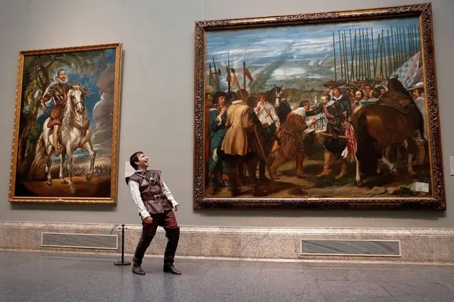 Spanish actor and director Daniel Ortiz performs “Soldado” (“Soldier”, in Spanish), a play written by Spanish academician, actor, guionist, film-maker and writer Fernando Fernan Gomez (Lima, 1921 – Madrid, 2007) next to Francisco Velazquez' “The Surrender of Breda”, also known as “Las lanzas” (“The Lances”) at the Prado Museum in Madrid, 18 March 2021. The performance has taken place to mark the centenary of Fernan Gomez' birth. (Photo by Chema Moya/EPA/EFE)