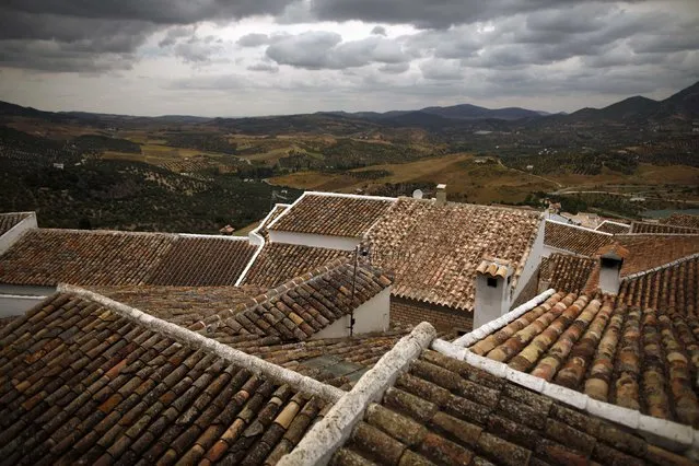 The tiled roofs of houses are seen in Zahara de la Sierra, southern Spain, on June 22, 2014. (Photo by Jon Nazca/Reuters)