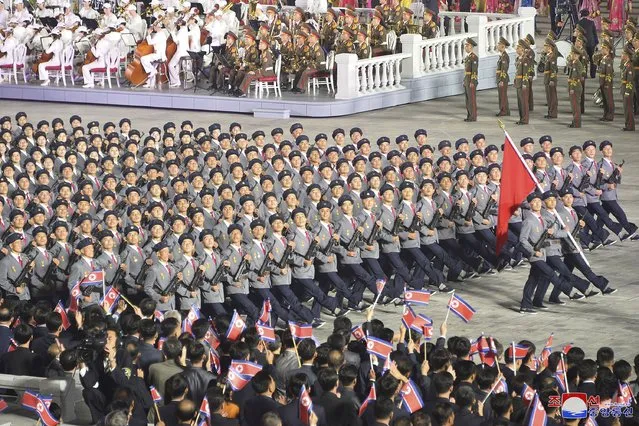 In this photo provided by the North Korean government, North Korean troops parade during a celebration of the nation’s 73rd anniversary that was overseen by leader Kim Jong Un, at Kim Il Sung Square in Pyongyang, North Korea, early Thursday, September 9, 2021. (Photo by KCNA via KNS/AFP Photo/Stringer)