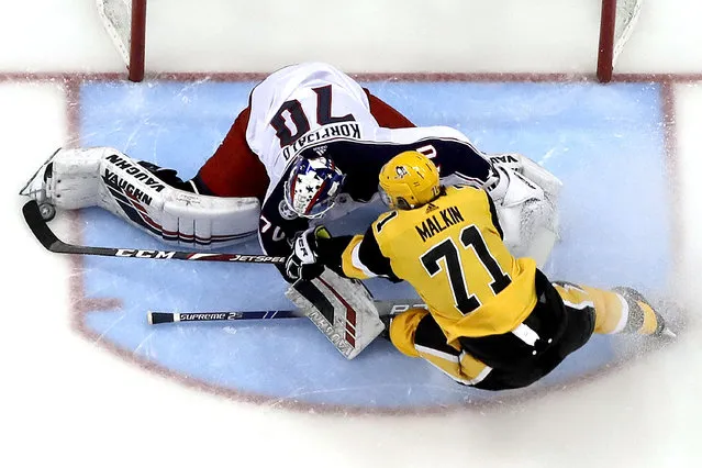 Pittsburgh Penguins' Evgeni Malkin (71) can't get a shot past Columbus Blue Jackets goaltender Joonas Korpisalo during the second period of an NHL hockey game in Pittsburgh, Thursday, March 7, 2019. The Penguins won 3-0. (Photo by Gene J. Puskar/AP Photo)