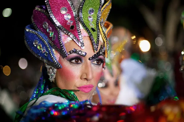 A member of 'Los Joroperos' performs in the troupes dancing contest during the Santa Cruz de Tenerife Carnival on March 1, 2014 in Santa Cruz de Tenerife on the Canary island of Tenerife, Spain. (Photo by Pablo Blazquez Dominguez/Getty Images)