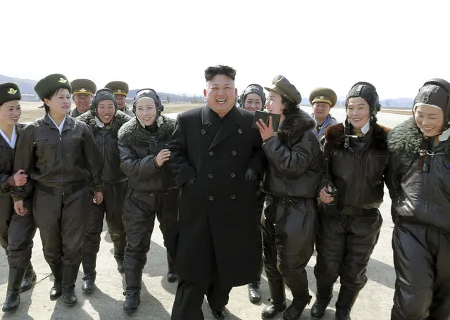 North Korean leader Kim Jong Un supervises a flight drill of the KPA Air and Anti-Air Force Unit 2620, honored with the Title of O Jung Hup-led 7th Regiment, in this undated photo released by North Korea's Korean Central News Agency (KCNA) March 7, 2014. (Photo by Reuters/KCNA)