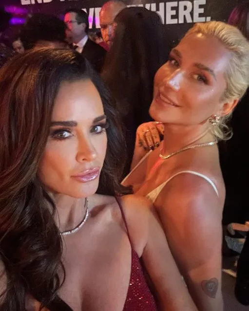 American actress and socialite Kyle Richards snags a selfie with American singer-songwriter Kesha at the Elton John AIDS Foundation's 32nd Annual Academy Awards Viewing Party on March 10, 2024 in West Hollywood, California. (Photo by kylerichards18/Instagram)