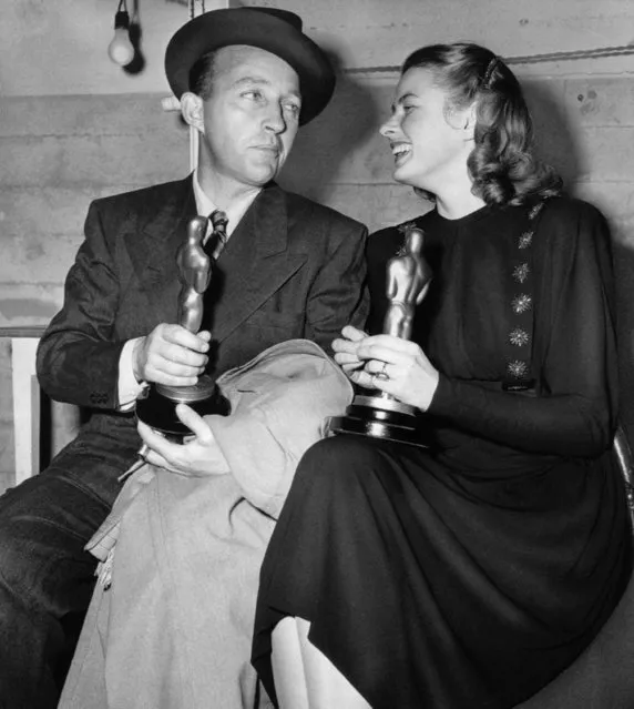 Bing Crosby and Ingrid Bergman compare Oscars they received in 1945 for best acting performances in 1944. Crosby won his Oscar  for his performance in 1944.  Crosby won his Oscar for his performance in “Going My Way”. Miss Bergman won for her role in “Gaslight”.   Crosby, the well-known singer, died on Friday, October 14, 1977 in Madrid, Spain, according to the Spanish News Agency Cifra. (Photo by AP Photo)