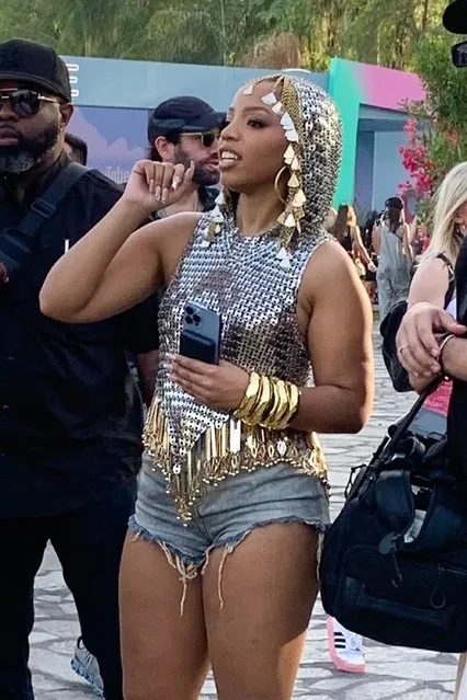 Singer Chloe Bailey is hard to miss in a shiny silver and gold ensemble while enjoying weekend 1 of Coachella in the second decade of April 2024. (Photo by Backgrid USA)