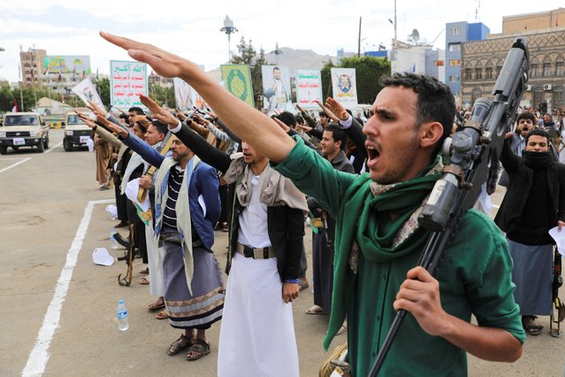 Participants take the oath of allegiance to the Houthi movement during a parade in a show of force amid a standoff in the Red Sea and U.S.-led airstrikes on Houthi targets, in Sanaa, Yemen, on February 8, 2024. (Photo by Khaled Abdullah/Reuters)