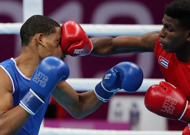 Cuba's Andy Cruz (R) in action with Dominican Republic's Hendri Cedeno Martinez at the Pan American Games in Lima, Peru on July 29, 2019. (Photo by Ivan Alvarado/Reuters)