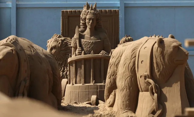 Detail of a sand sculpture is seen as pieces are prepared as part of this year's “Once Upon a Time” themed annual Weston-super-Mare Sand Sculpture festival on April 16, 2014 in Weston-Super-Mare, England. (Photo by Matt Cardy/Getty Images)