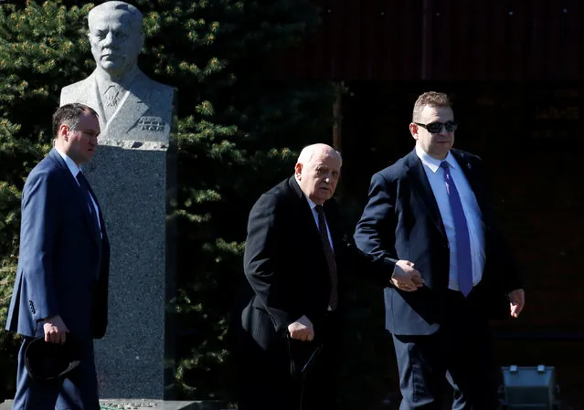 Former Soviet president Mikhail Gorbachev (C) arrives prior to the Victory Day parade, marking the 71st anniversary of the victory over Nazi Germany in World War Two, at Red Square in Moscow, Russia, May 9, 2016. (Photo by Grigory Dukor/Reuters)