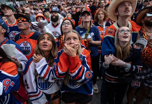 Fans of the Edmonton Oilers, attending a watch party in Edmonton, Alberta, react after their team lost Game 7 of the Stanley Cup Final on Monday, June 24, 2024. (Photo by Jason Franson/The Canadian Press/AP Photo)