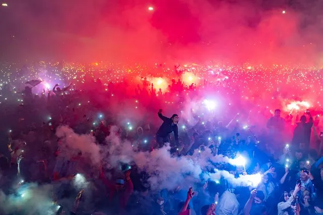 Trabzonspor supporters celebrate after winning the Turkish Super Lig championship football title, in Istanbul, on May 8, 2022. Trabzonspor won the Turkish Super Lig title on April 30, 2022 for first time in 38 years. (Photo by Yasin Akgul/AFP Photo)
