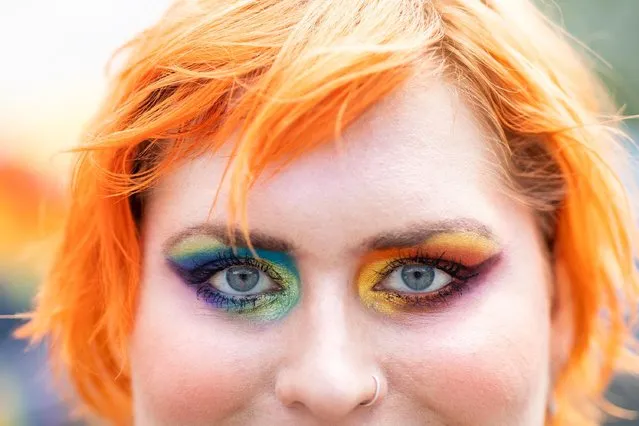 Allyson Finke of Waterford wears colourful make up during Ferndale Pride, in Ferndale, Michigan, U.S., June 4, 2022. (Photo by Emily Elconin/Reuters)