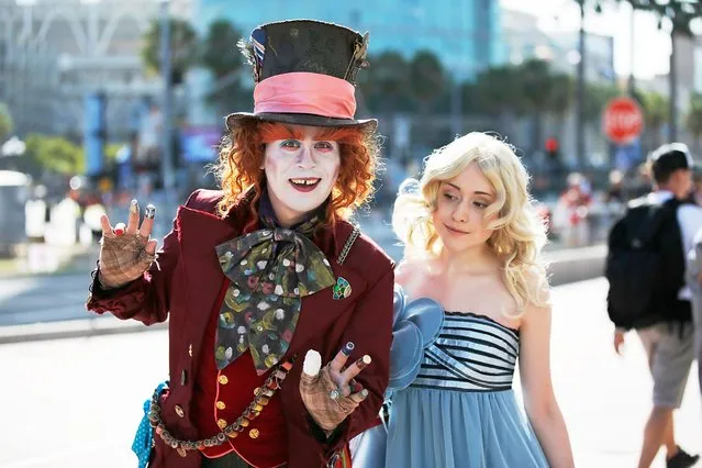 Fans in costume attend Comic-Con International 2014 – Day 1 on July 24, 2014 in San Diego, Calif. (Photo by Joe Scarnici/FilmMagic/Getty Images)