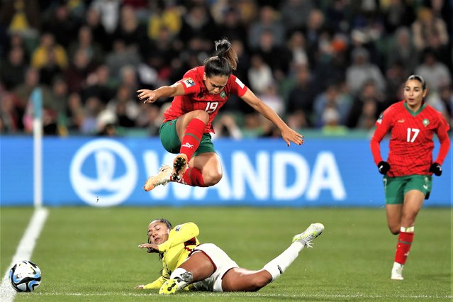 Morocco's Hanane Ait El Haj, right, watches as Colombia's Manuela Vanegas, down, challenges Morocco's Sakina Ouzraoui during the Women's World Cup Group H soccer match between Morocco and Colombia in Perth, Australia, Thursday, August 3, 2023. (Photo by Gary Day/AP Photo)