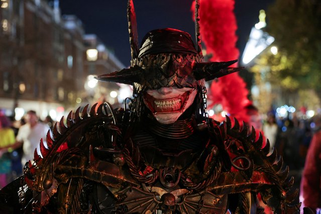 A person wearing a costume takes part in the annual NYC Halloween Parade in New York City on October 31, 2024. (Photo by Jeenah Moon/Reuters)