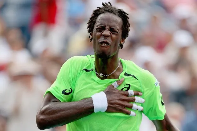 Gael Monfils of France celebrates after defeating Grigor Dimitrov of Bulgaria in their men's singles fourth round match on Day Nine of the 2014 US Open at the USTA Billie Jean King National Tennis Center on September 2, 2014 in the Flushing neighborhood of the Queens borough of New York City. (Photo by Matthew Stockman/Getty Images)