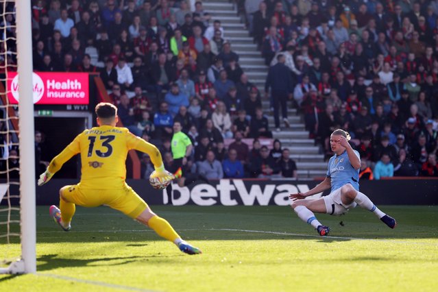 Kepa Arrizabalaga of AFC Bournemouth fails to make a save as Erling Haaland of Manchester City scores his team's first goal during the Emirates FA Cup Quarter Final match between AFC Bournemouth and Manchester City at Vitality Stadium on March 30, 2025 in Bournemouth, England. (Photo by Alex Pantling/Getty Images)