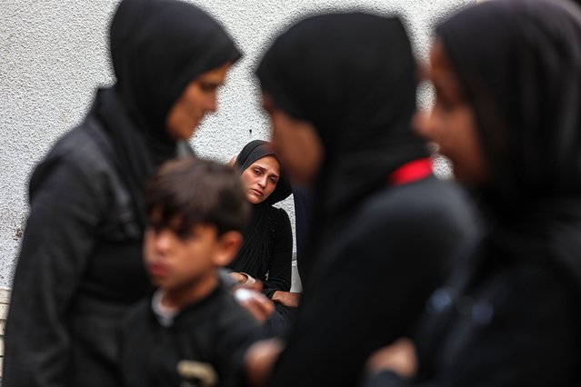 Bodies of Palestinians, who lost their lives following Israeli attacks, are taken from the Al-Ahli Baptist Hospital morgue by their relatives to be buried after the funeral prayers in Gaza City, Gaza on March 27, 2025. (Photo by Omar Ashtawy/APAImages/Rex Features/Shutterstock)