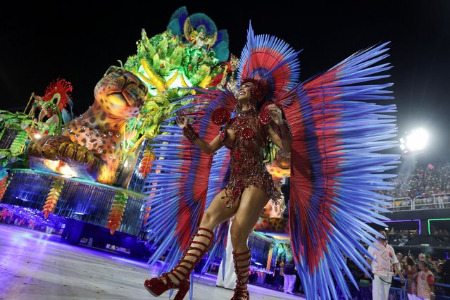 A reveler from Salgueiro samba school performs during the night of the Carnival parade at the Sambadrome, in Rio de Janeiro, Brazil, on February 12, 2024. (Photo by Ricardo Moraes/Reuters)