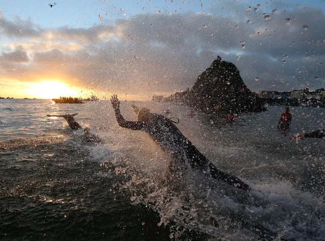Athletes compete during the swim section of Ironman Wales on September 18, 2016 in Pembroke, Wales. (Photo by Nigel Roddis/Getty Images for Ironman)
