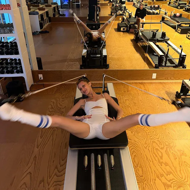 American model Bella Hadid endures reformer Pilates in the first decade of January 2023. (Photo by bellahadid/Instagram)