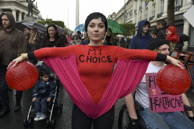 Demonstrators take part in a protest to urge the Irish Government to repeal the 8th amendment to the constitution, which enforces strict limitations to a woman's right to an abortion, in Dublin, Ireland September 24, 2016. (Photo by Clodagh Kilcoyne/Reuters)