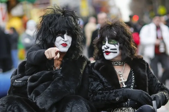 Paul Stanley (L) and Eric Singer of KISS attend the 88th Macy's Thanksgiving Day Parade in New York November 27, 2014. (Photo by Eduardo Munoz/Reuters)