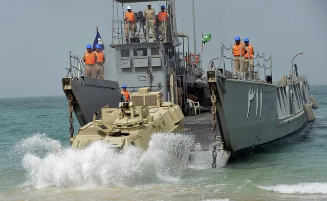 In this undated photo released by Saudi Press Agency, SPA, the Royal Saudi Navy conducts military exercises dubbed Gulf Shield One in the Strait of Hormuz and the Sea of Oman. As Saudi Arabia holds a naval drill in the strategic Strait of Hormuz, a powerful Iranian general has been quoted as suggesting the kingdom’s deputy crown prince is so “impatient” he may kill his own father to take the throne. While harsh rhetoric has been common between the two rivals since January, the outrageous comments by Revolutionary Guard Gen. Qassem Soleimani take things to an entirely different level by outright discussing Saudi King Salman being killed. (Photo by Saudi Press Agency via AP Photo)
