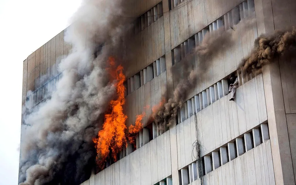 Men Fall From Building Inferno