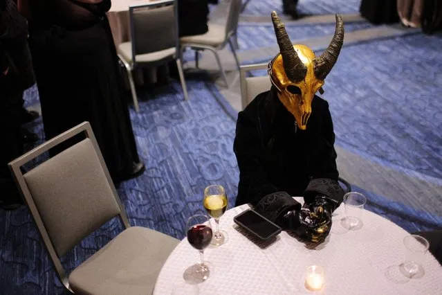 Attendees take part in the Satanic Ball during the Satanic Temple's Satancon 2023, which they call an “in-person conference for congregations, campaigns, members, and supporters”, in Boston, Massachusetts, U.S., April 28, 2023. (Photo by Brian Snyder/Reuters)