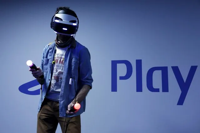 A visitor plays a game on a PlayStation VR at the Paris Games Week, a trade fair for video games in Paris, France, October 28, 2015. (Photo by Benoit Tessier/Reuters)