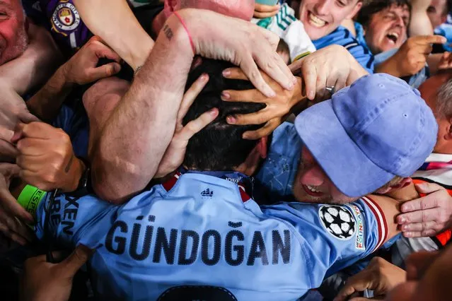 Ilkay Gündogan of Manchester City celebrates with the fans after the UEFA Champions League 2022/23 final match between Manchester City FC and FC Internazionale at Ataturk Olympic Stadium on June 10, 2023 in Istanbul, Turkey. (Photo by Marc Atkins/Getty Images)