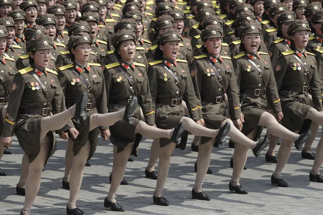 In this April 15, 2017, file photo, women soldiers march across Kim Il Sung Square during a military parade in Pyongyang, North Korea, to celebrate the 105th birth anniversary of Kim Il Sung, the country's late founder and grandfather of current ruler Kim Jong Un. A massive military parade is expected on Sunday, September 9, 2018, to mark the 70th anniversary of the founding of North Korea’s socialist government, Goose-stepping soldiers are the most spectacular part of North Korea’s massive military parades. (Photo by Wong Maye-E/AP Photo)